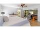 Main bedroom with access to backyard and ensuite bathroom at 7 Huntley Ct., Haines City, FL 33844