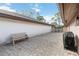 Outdoor patio area featuring paver flooring, bench, and space for outdoor dining or relaxation at 7 Huntley Ct., Haines City, FL 33844