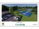 This aerial scene highlights the community pickleball courts, perfect for active residents and gatherings at 7 Huntley Ct., Haines City, FL 33844