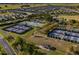 Aerial view of the pickleball and tennis courts and the community at 9143 Sw 65Th Loop, Ocala, FL 34481