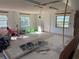 Spacious unfinished basement with multiple windows, offering potential for customization at 116 Main St, Windermere, FL 34786