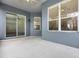 View of covered porch with outdoor lighting and ceiling fan at 2806 Balforn Tower Way, Winter Garden, FL 34787