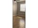 Spacious bedroom with tile flooring and ceiling fan at 5317 Curry Ford Rd # J101, Orlando, FL 32812