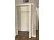 Spacious closet with double doors and hanging rod at 5317 Curry Ford Rd # J101, Orlando, FL 32812