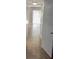 Bright hallway with tile flooring and doors to rooms at 5317 Curry Ford Rd # J101, Orlando, FL 32812