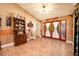 Bright and spacious entryway with double doors leading to the backyard at 710 Kellys Cv, Ocoee, FL 34761