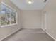 Spacious bedroom with neutral walls and carpeted floors at 7474 Bentonshire Ave, Windermere, FL 34786