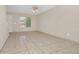 Bright living room with tile floors and ceiling fan at 113 Kristi Ann Ct # 113, Winter Springs, FL 32708