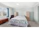 Spacious bedroom with a large bed and ample closet space at 17833 Blazing Star Cir, Clermont, FL 34714