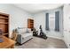 Bedroom with a desk, bookshelf, and an exercise bike at 17833 Blazing Star Cir, Clermont, FL 34714