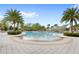 Enjoy a refreshing dip in this resort-style pool with shaded areas at 17833 Blazing Star Cir, Clermont, FL 34714
