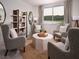 Cozy sitting area with comfortable chairs and a large window at 2332 Citrus Bloom Dr, Bartow, FL 33830