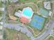 An aerial view of the community pool, tennis courts and basketball court at 2485 Huron Cir, Kissimmee, FL 34746
