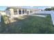 Large grassy backyard enclosed by a privacy fence at 2485 Huron Cir, Kissimmee, FL 34746