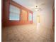 Bright bonus room with tile flooring and access to other rooms at 2485 Huron Cir, Kissimmee, FL 34746