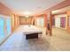 Spacious game room with pool table and plenty of natural light at 2485 Huron Cir, Kissimmee, FL 34746
