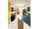 Spacious kitchen offering generous counter space and wooden cabinetry at 2485 Huron Cir, Kissimmee, FL 34746