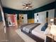 This well-lit primary bedroom features tile flooring and outdoor access at 2485 Huron Cir, Kissimmee, FL 34746