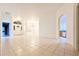 Open and spacious living area with tile flooring and high ceilings at 2485 Huron Cir, Kissimmee, FL 34746