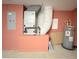 A utility room featuring a new water heater and HVAC system at 2485 Huron Cir, Kissimmee, FL 34746
