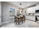 Kitchen dining area with table and chairs near window at 2904 Gipper Cir, Sanford, FL 32773