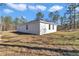 Expansive backyard with ample space, perfect for relaxation, recreation, and enjoying the natural surroundings at 406 Nw Narcissus Rd, Dunnellon, FL 34431