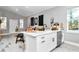 Open-concept layout seamlessly connects the kitchen with the living area, great for entertaining at 406 Nw Narcissus Rd, Dunnellon, FL 34431