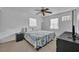Spacious bedroom with ceiling fan and neutral decor at 842 E Church Ave, Longwood, FL 32750