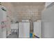 Laundry room with washer, dryer and utility sink at 842 E Church Ave, Longwood, FL 32750