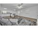 Open living room and kitchen with island at 842 E Church Ave, Longwood, FL 32750