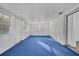 Sunroom features blue carpet and multiple windows at 842 E Church Ave, Longwood, FL 32750