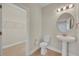 Clean bathroom with pedestal sink and toilet at 14157 Creekbed Cir, Winter Garden, FL 34787