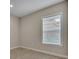 Bright bedroom with carpeted floor and window with blinds at 14157 Creekbed Cir, Winter Garden, FL 34787