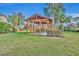 Relaxing gazebo with picnic tables in a community space at 14157 Creekbed Cir, Winter Garden, FL 34787