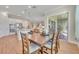 Bright dining area with table and chairs, near kitchen at 14157 Creekbed Cir, Winter Garden, FL 34787