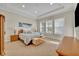 Spacious main bedroom with ample natural light at 14157 Creekbed Cir, Winter Garden, FL 34787