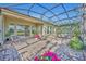 Large screened patio with paver stones at 14157 Creekbed Cir, Winter Garden, FL 34787