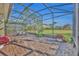 Spacious screened patio, perfect for relaxing at 14157 Creekbed Cir, Winter Garden, FL 34787