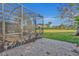 Screened patio with backyard view at 14157 Creekbed Cir, Winter Garden, FL 34787
