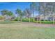 Community playground with swings and slide at 14157 Creekbed Cir, Winter Garden, FL 34787