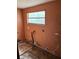 Unfinished laundry room with exposed plumbing and walls at 3108 Lawrence St, Orlando, FL 32805