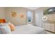 Bedroom with window, dresser, and full-size bed at 3151 Riachuelo Ln, Kissimmee, FL 34744