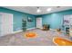 Teal bedroom with bunk beds and game table at 3151 Riachuelo Ln, Kissimmee, FL 34744