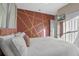 Bedroom with geometric accent wall and queen bed at 3151 Riachuelo Ln, Kissimmee, FL 34744