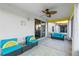 Screened porch with patio furniture and ceiling fan at 3151 Riachuelo Ln, Kissimmee, FL 34744