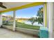 Enjoy serene lake views from this screened porch with comfortable seating at 3151 Riachuelo Ln, Kissimmee, FL 34744