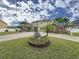 Stately home with mature landscaping and a circular driveway at 3301 Buckingham Way, St Cloud, FL 34772