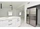 Kitchen featuring stainless steel appliances, marble counters, and flooring at 5255 Seminole Ave, Winter Park, FL 32792