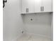 Laundry area features white cabinets and modern design; functional space at 5255 Seminole Ave, Winter Park, FL 32792