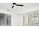 Open-concept living room showcasing modern lighting, clean lines and a staircase at 5255 Seminole Ave, Winter Park, FL 32792